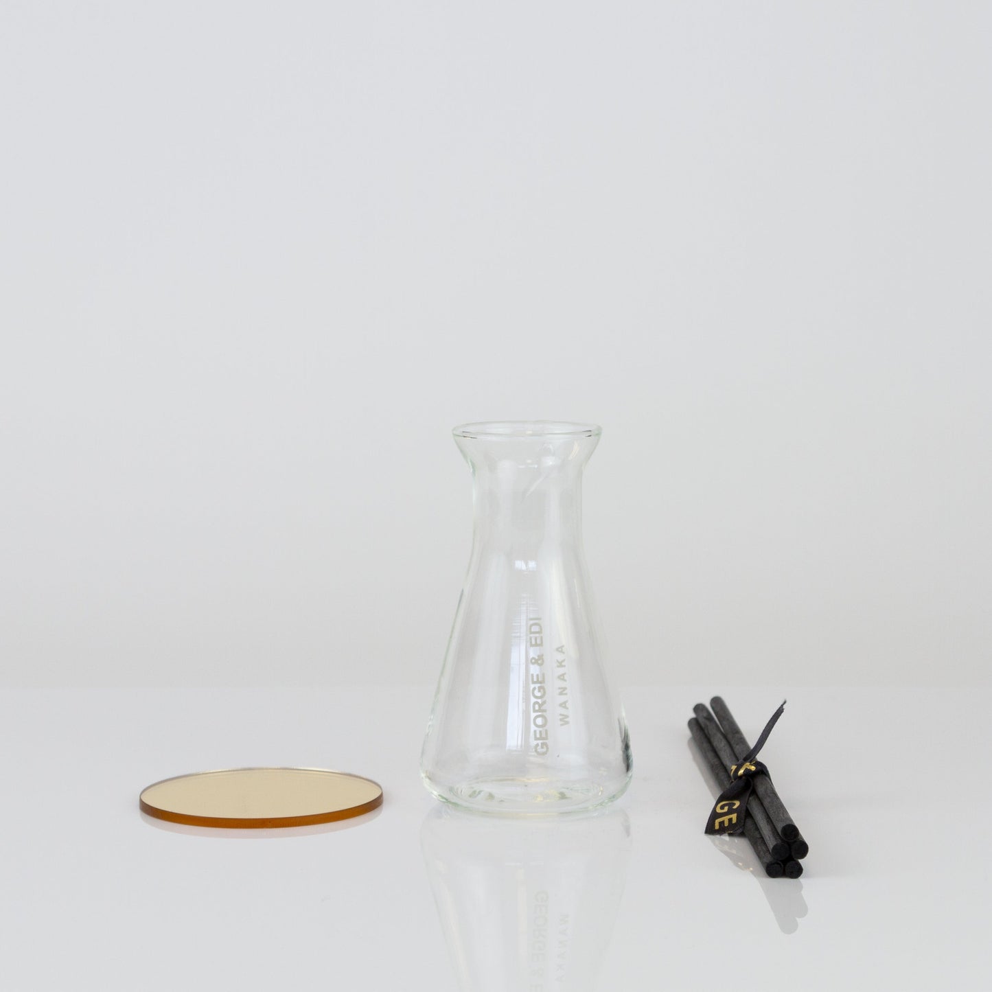 Buy your own diffuser flask vessel mirror disk and reeds